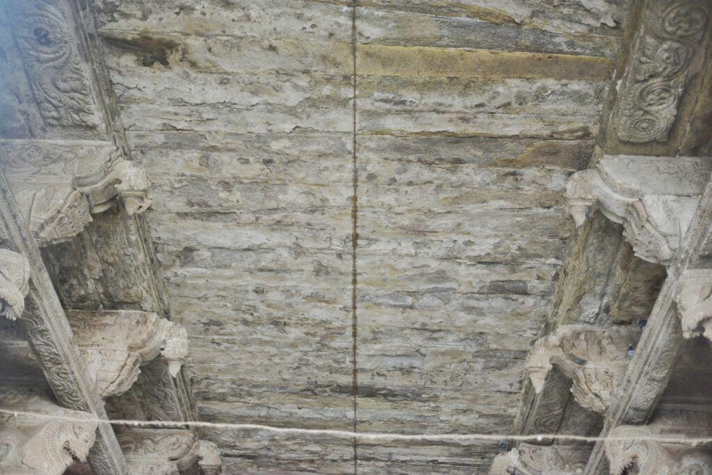 Damaged roof of Pudhumandabam